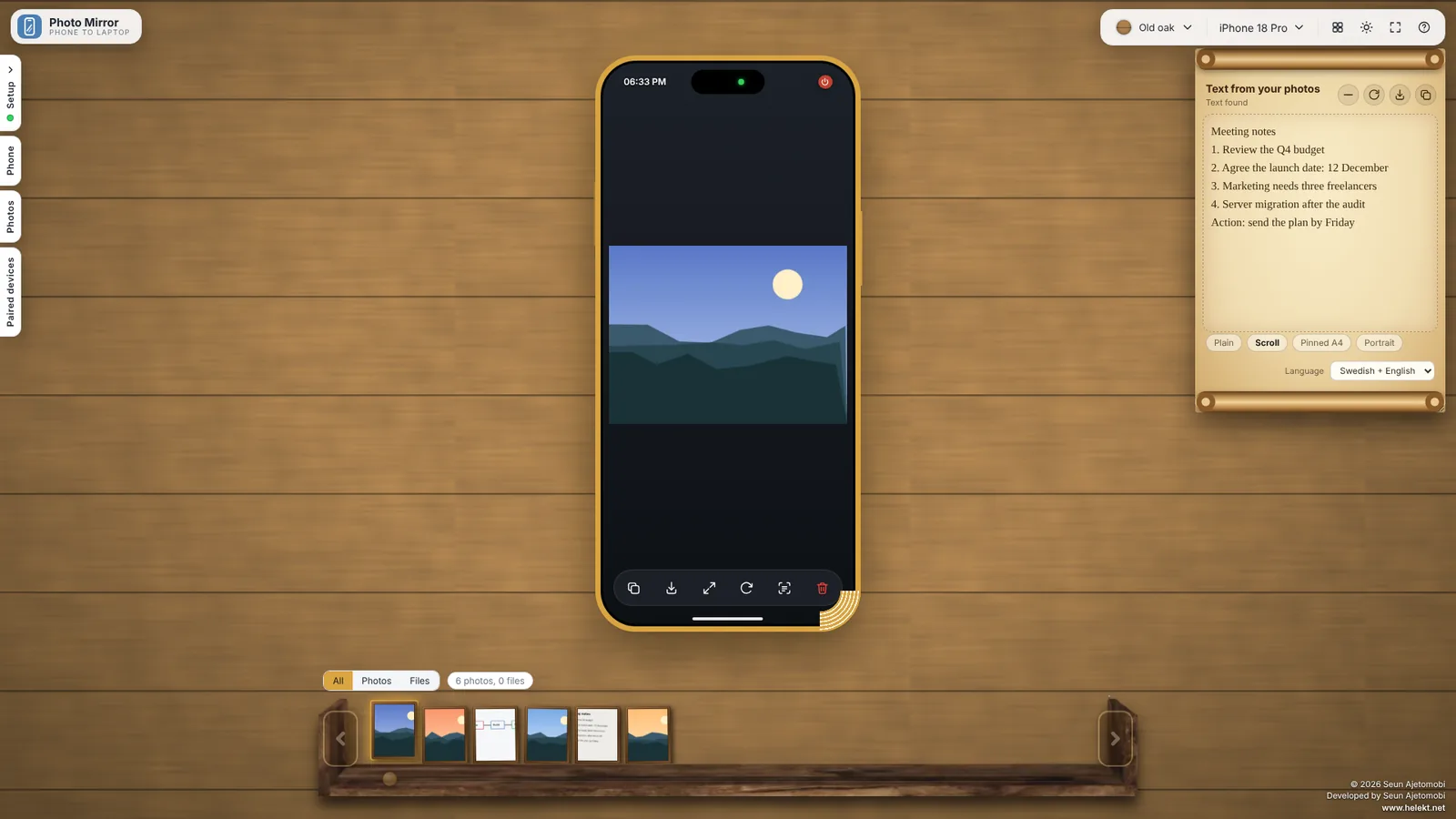 Photo Mirror on a computer: a phone preview in the middle, photos on a wooden shelf below and text read from a photo on the right.
